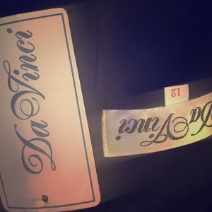 Knee length black corset top to flowing skirt